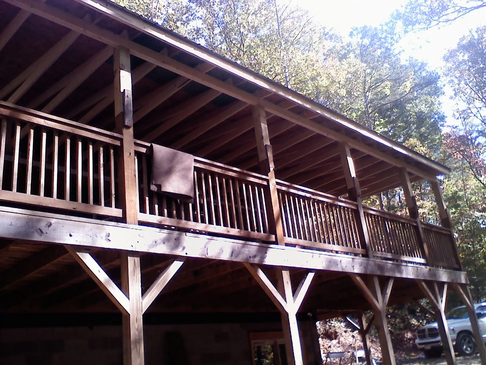 Timber framing under a new elevated porch and deck — Roof Leak Repair in Quinlan by Roofing Brothers